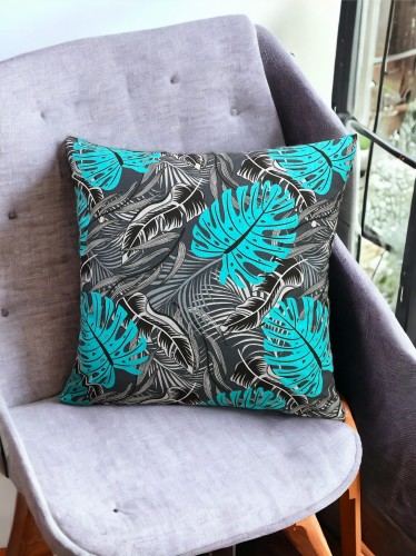 Bawełniana poszewka z turkusowym motywem liści monstery