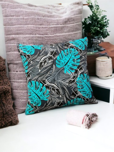 Bawełniana poszewka z turkusowym motywem liści monstery