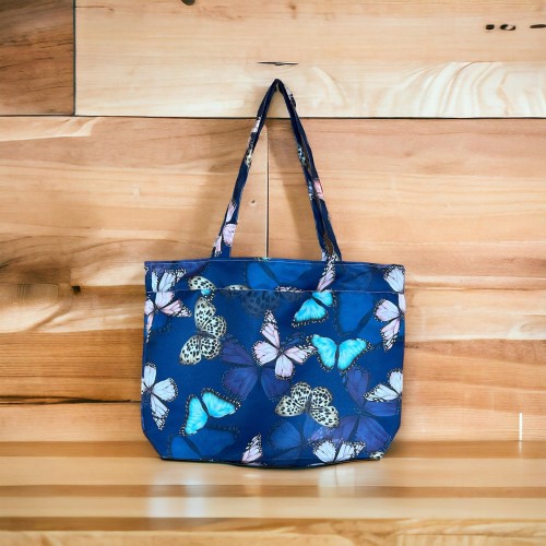 Torba w motylki na granatowym tle